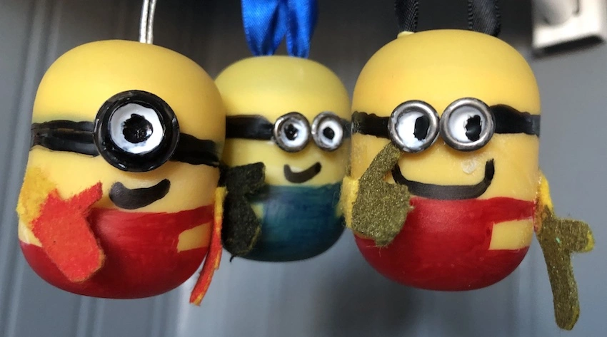 Three minion figures made from plastic Kinder eggs