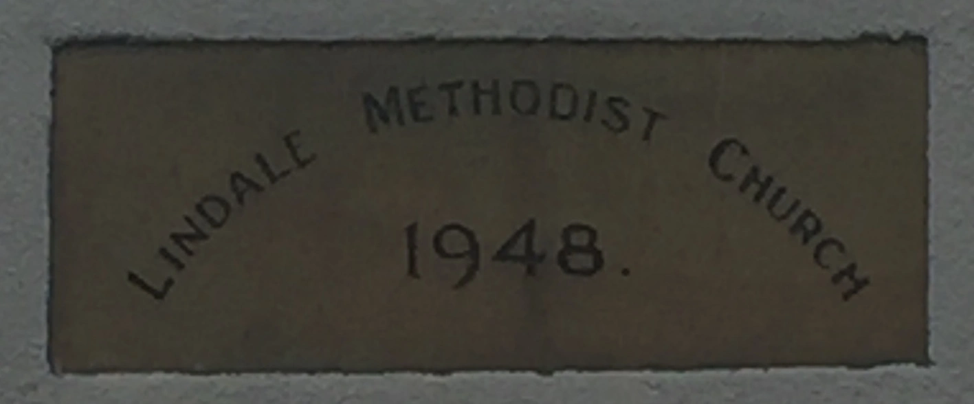 Stone showing name of Lindale Methodist Church and date 1948