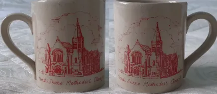 White ceramic mug with the image of a church transfer-printed in red on both sides